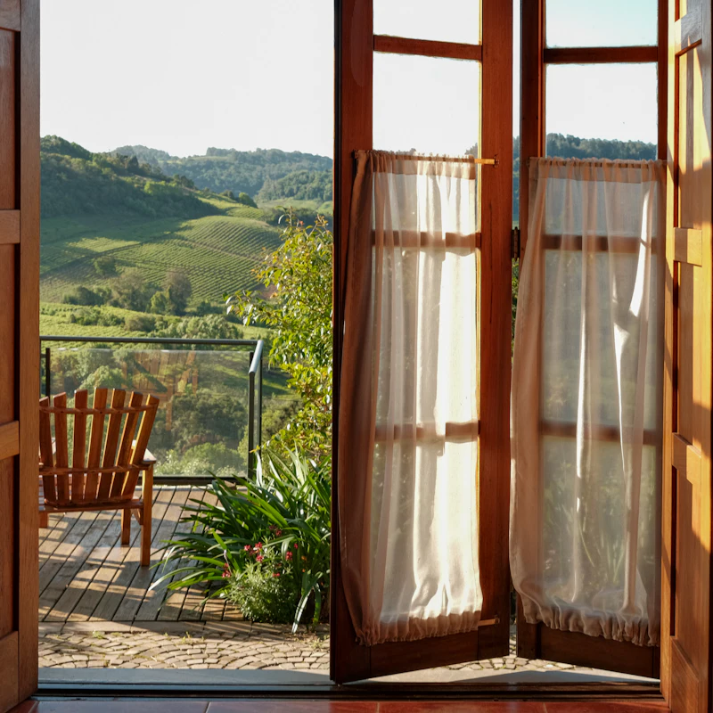 Open doors onto rolling hills